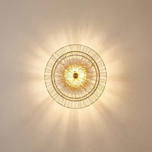 Sona wall light casting a soft wash of light on a plaster wall