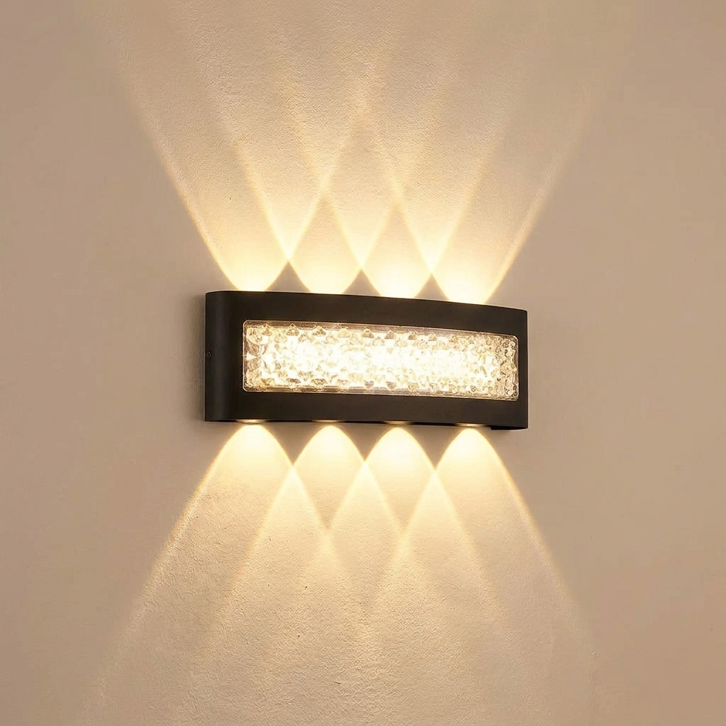Wall sconce casting a soft wash of light on a warm plaster wall