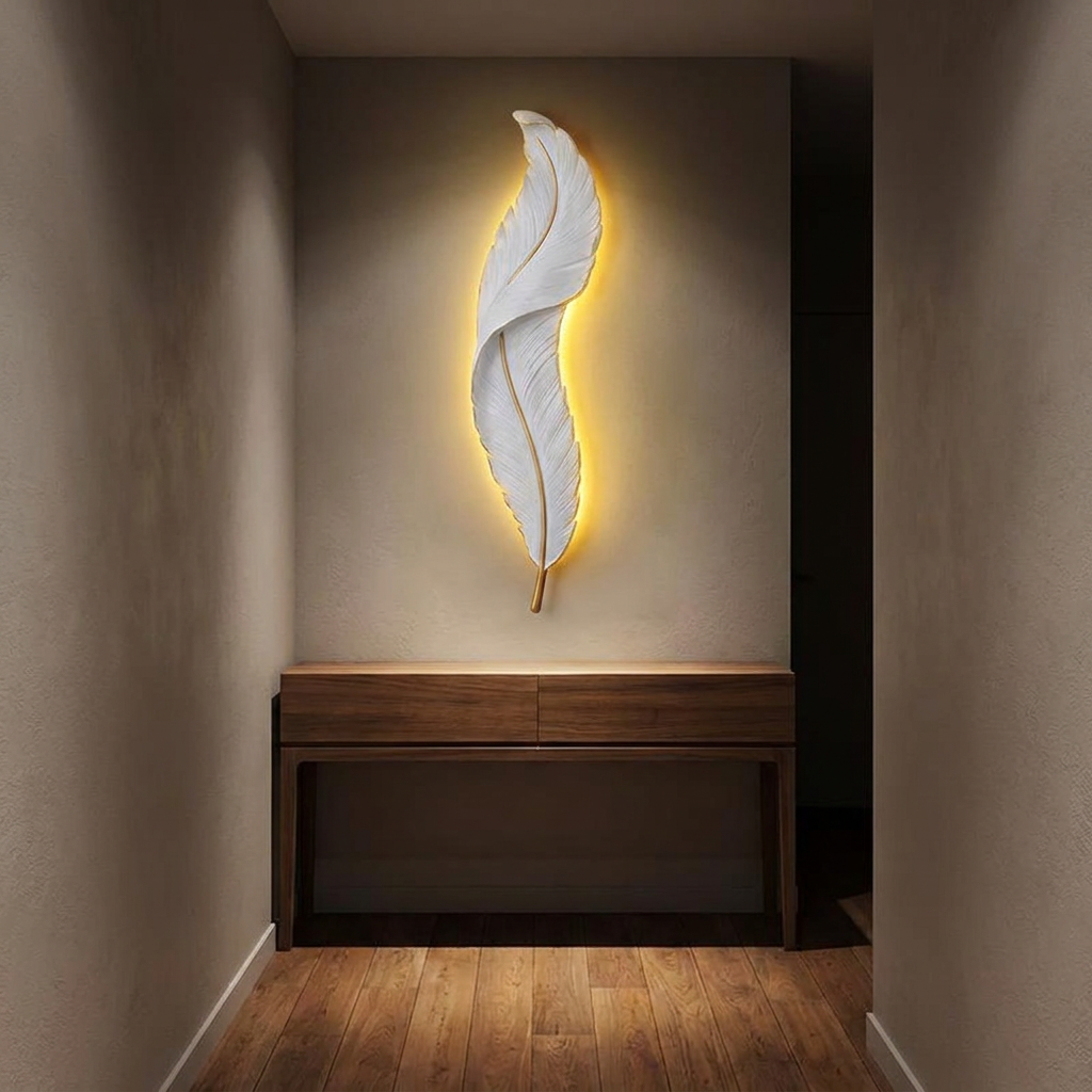 Pebble wall light above a walnut console in a hallway at night