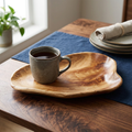 Braan wood serving tray on a walnut dining table with a stoneware mug